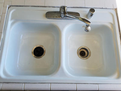 Sink we cut out and replaced in an existing tile counter top.