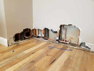 Copper repair work, this is a slab leak re-routed through the wall.